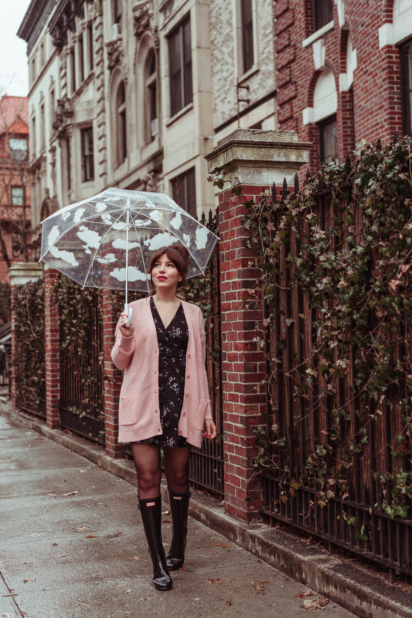 Rainy Day Outfit, Evelyn Bourdon wearing button front floral skater dress, Caslon pink relaxed boyfriend cardigan, Hunter Original Refined High Gloss Rain Boots