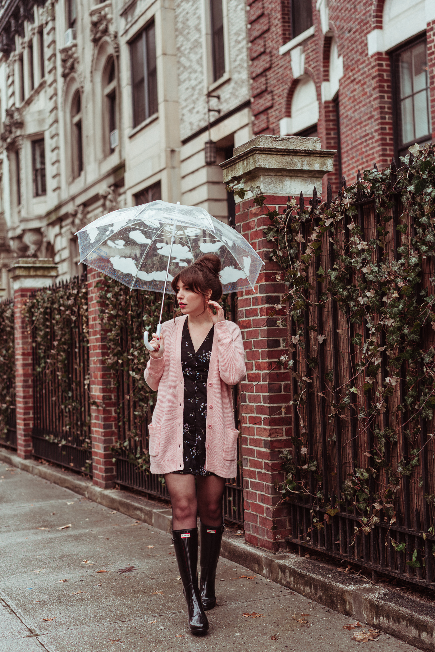 Rainy Day Outfit, Evelyn Bourdon wearing button front floral skater dress, Caslon pink relaxed boyfriend cardigan, Hunter Original Refined High Gloss Rain Boots