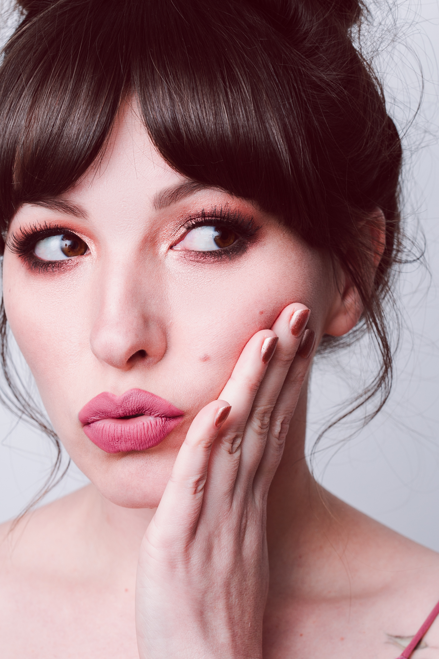 woman showing her nails for Galentine's day beauty