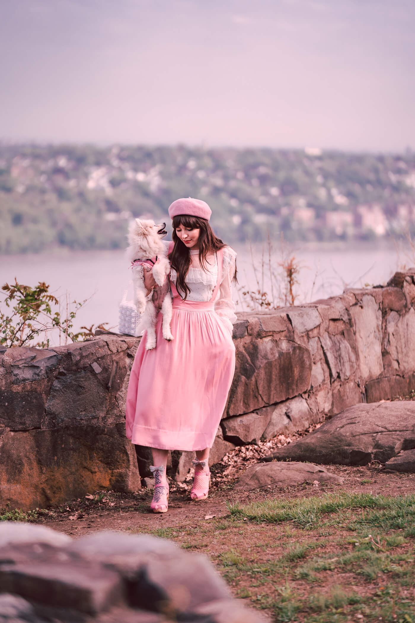 woman wearing pink dress and sharing getting dressed and feeling better