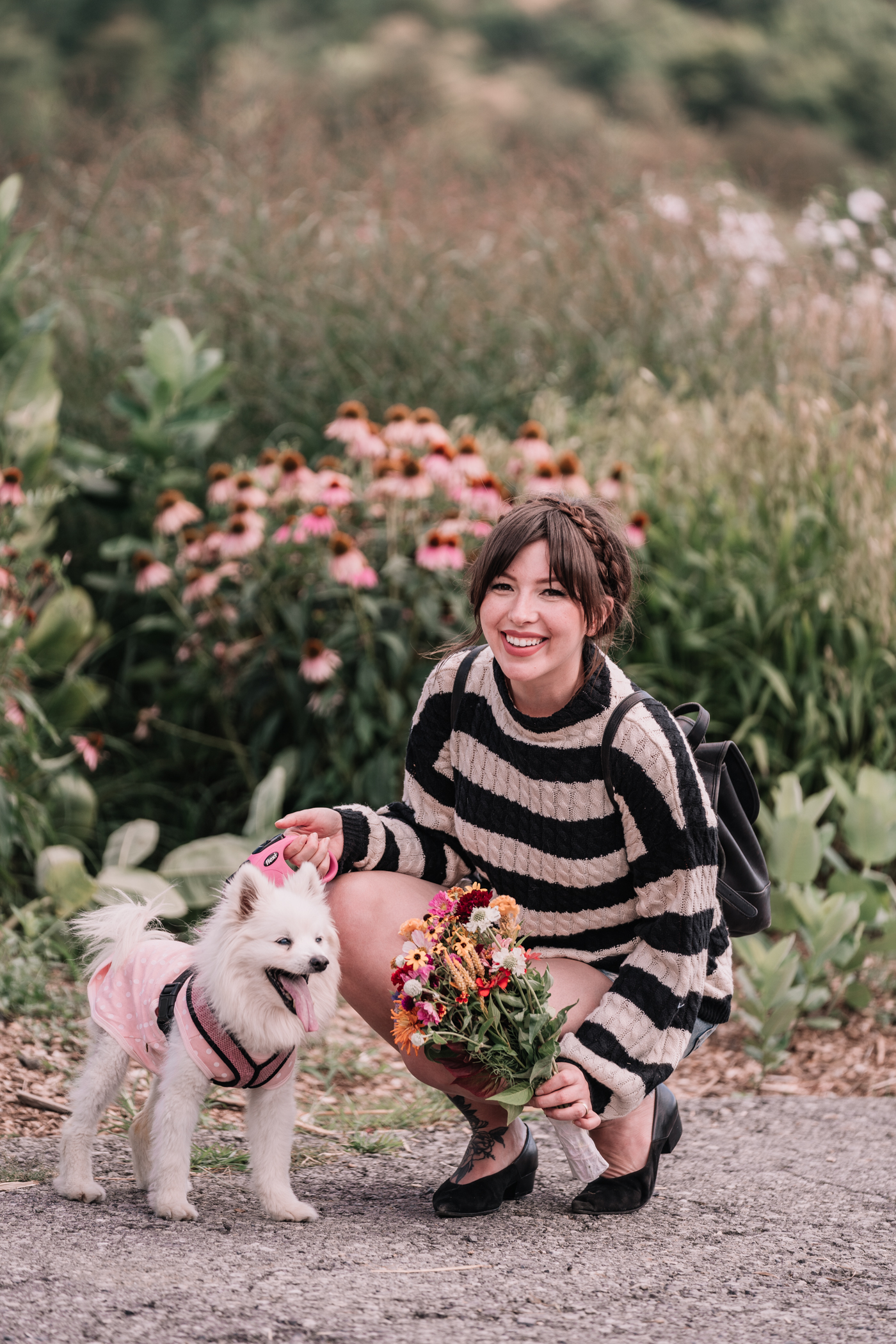 woman with her dog for sale of the season