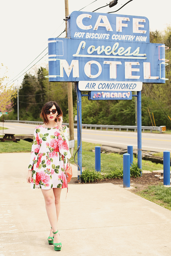 woman wearing asos floral dress