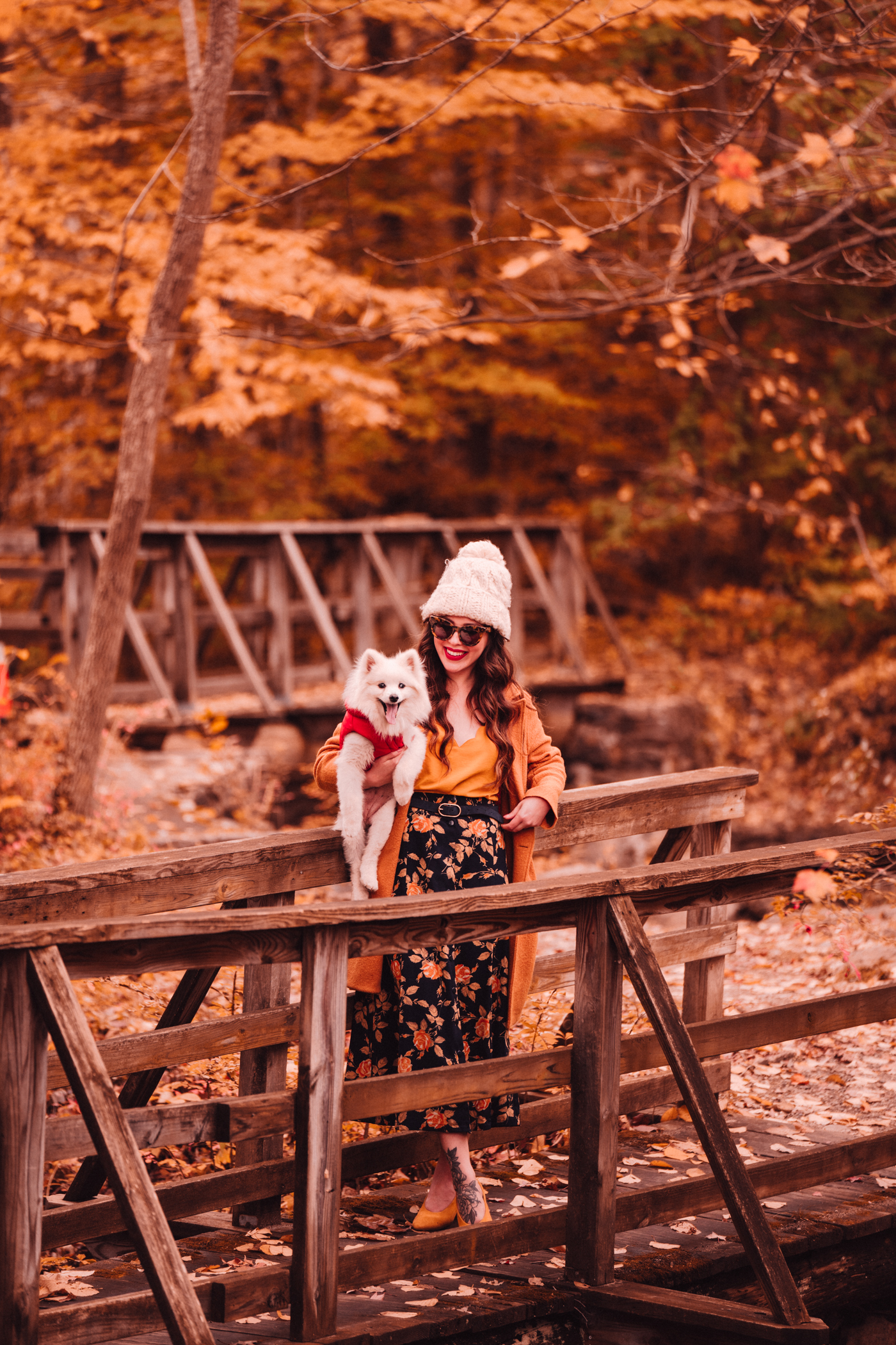 woman in the bridge with her dog 