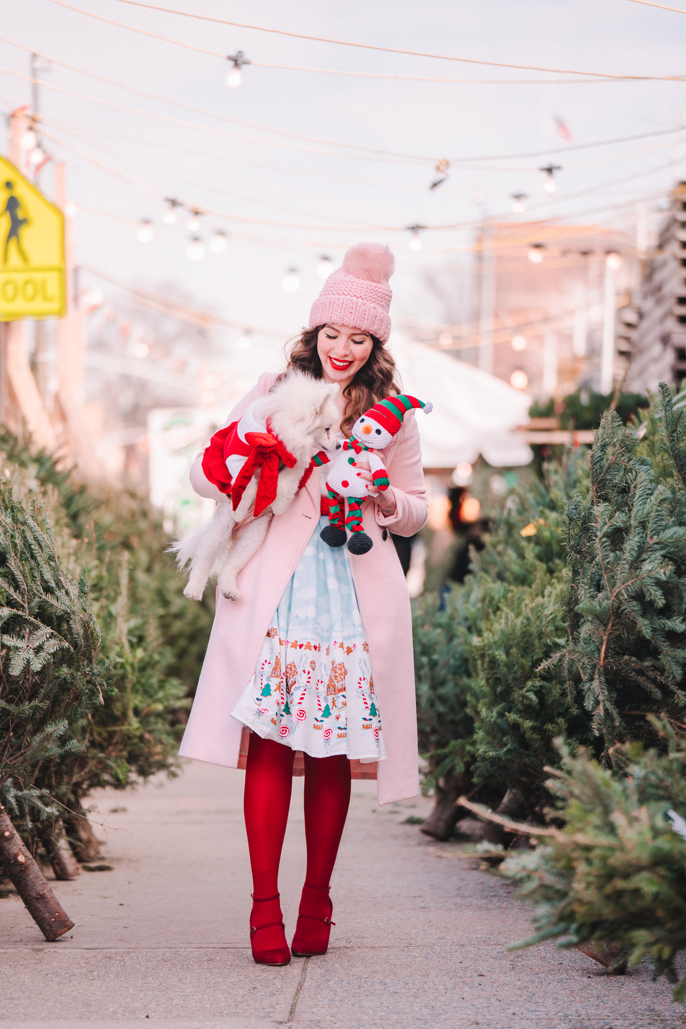 woman walking in the street with her dog Under My Tree