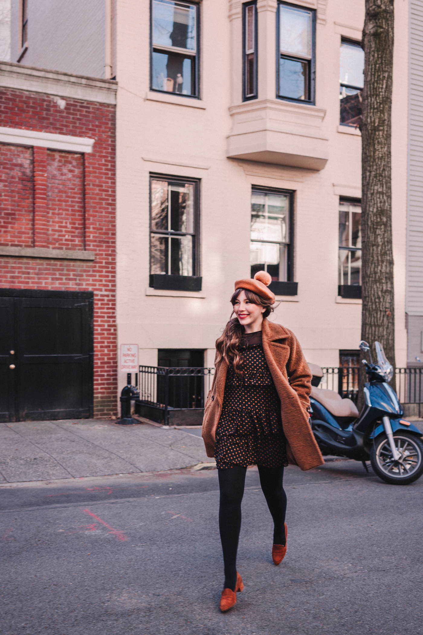 woman wearing Heart print dress and sweater 