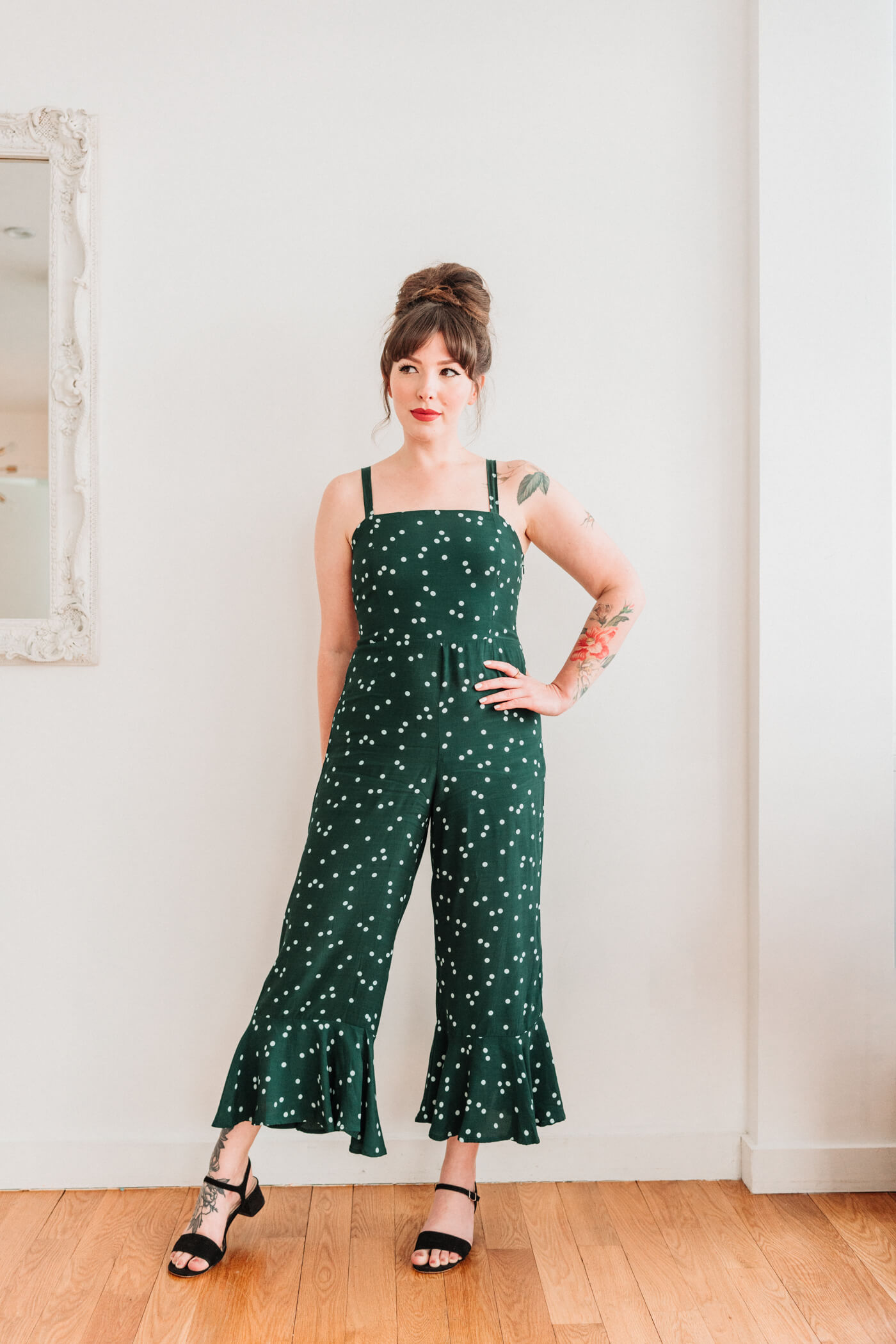 woman in green jumper and sandals 