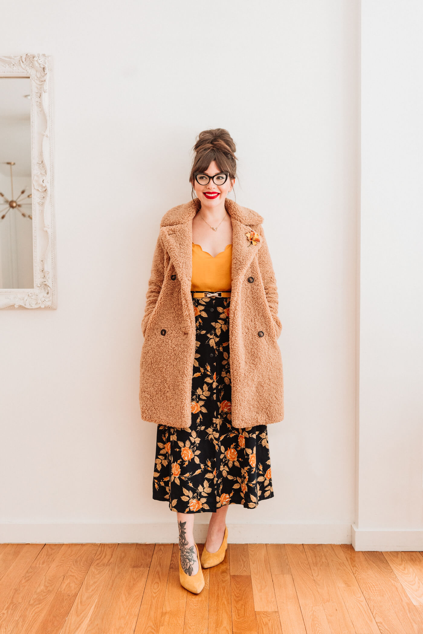 woman wearing yellow top and skirt 