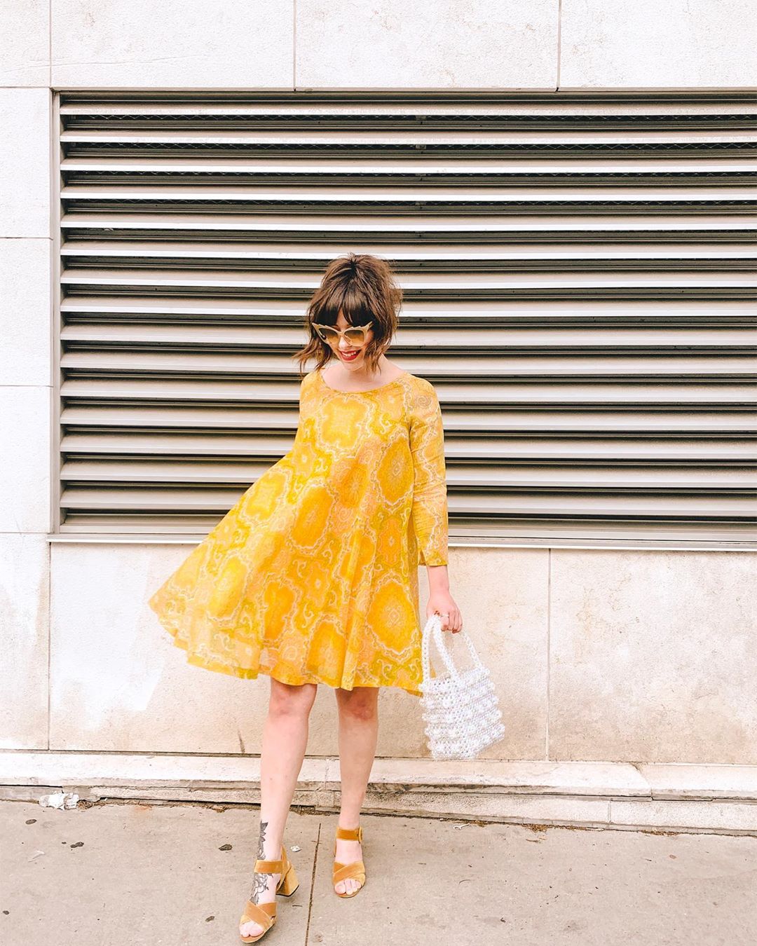 woman in yellow dress for Weekend Link Roundup