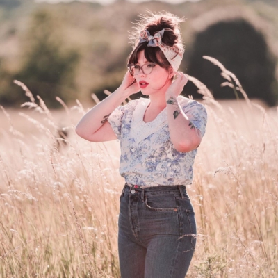 woman wearing floral top and pants for Weekend Link Roundup