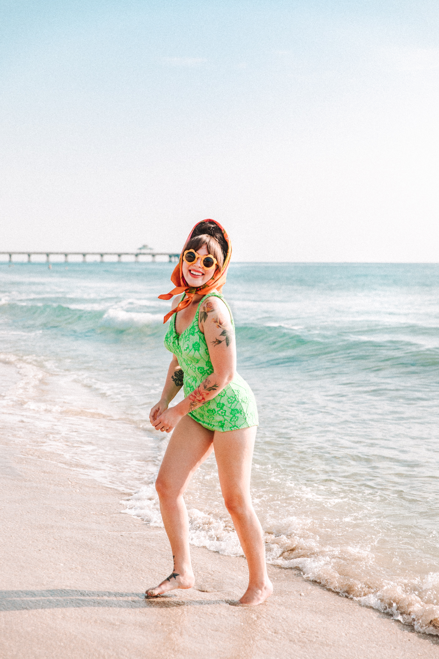 woman wearing a one piece bathing suit and sharing adjusting to suburban life