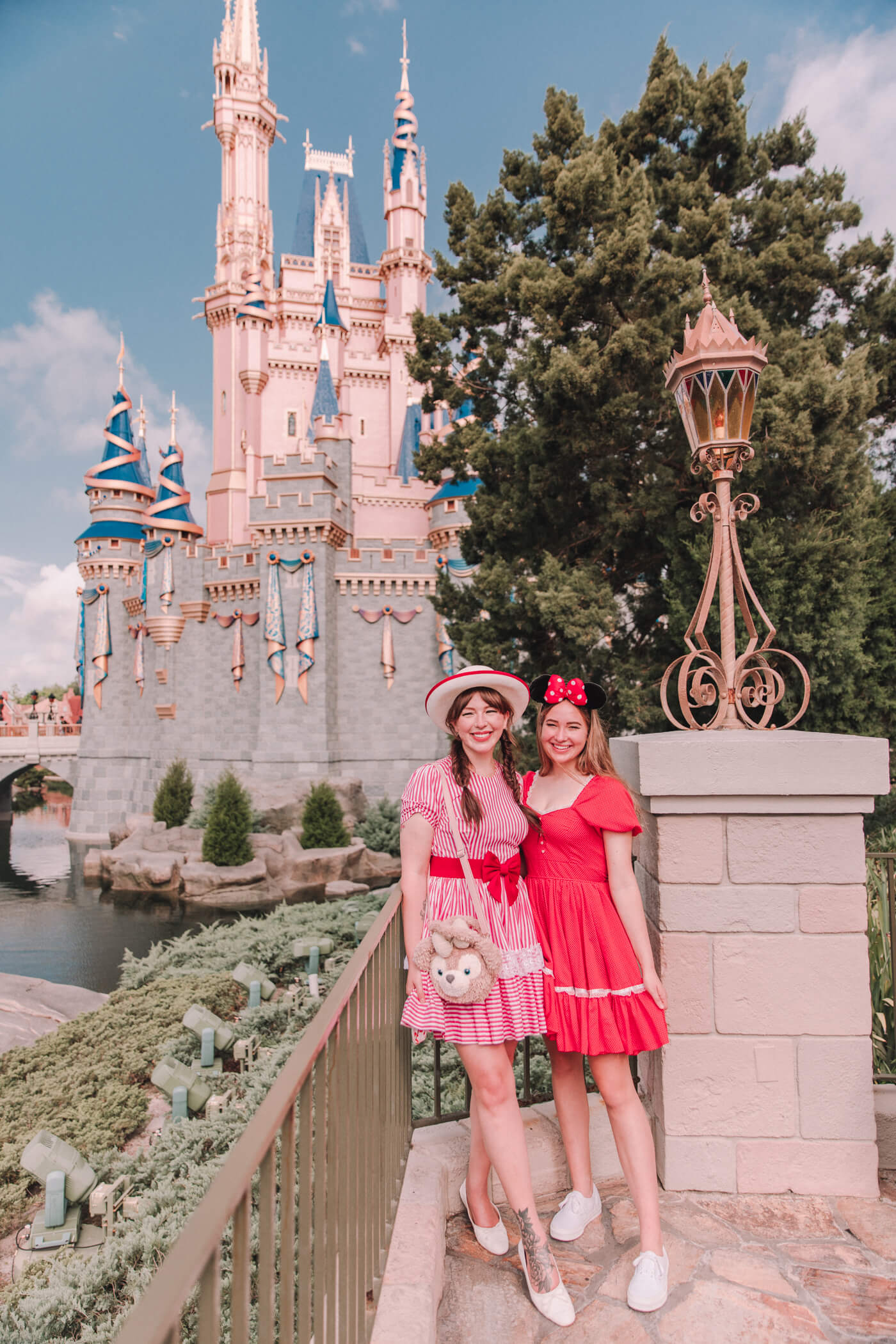 two women wearing red dresses for Affordable Clothing and Accessory