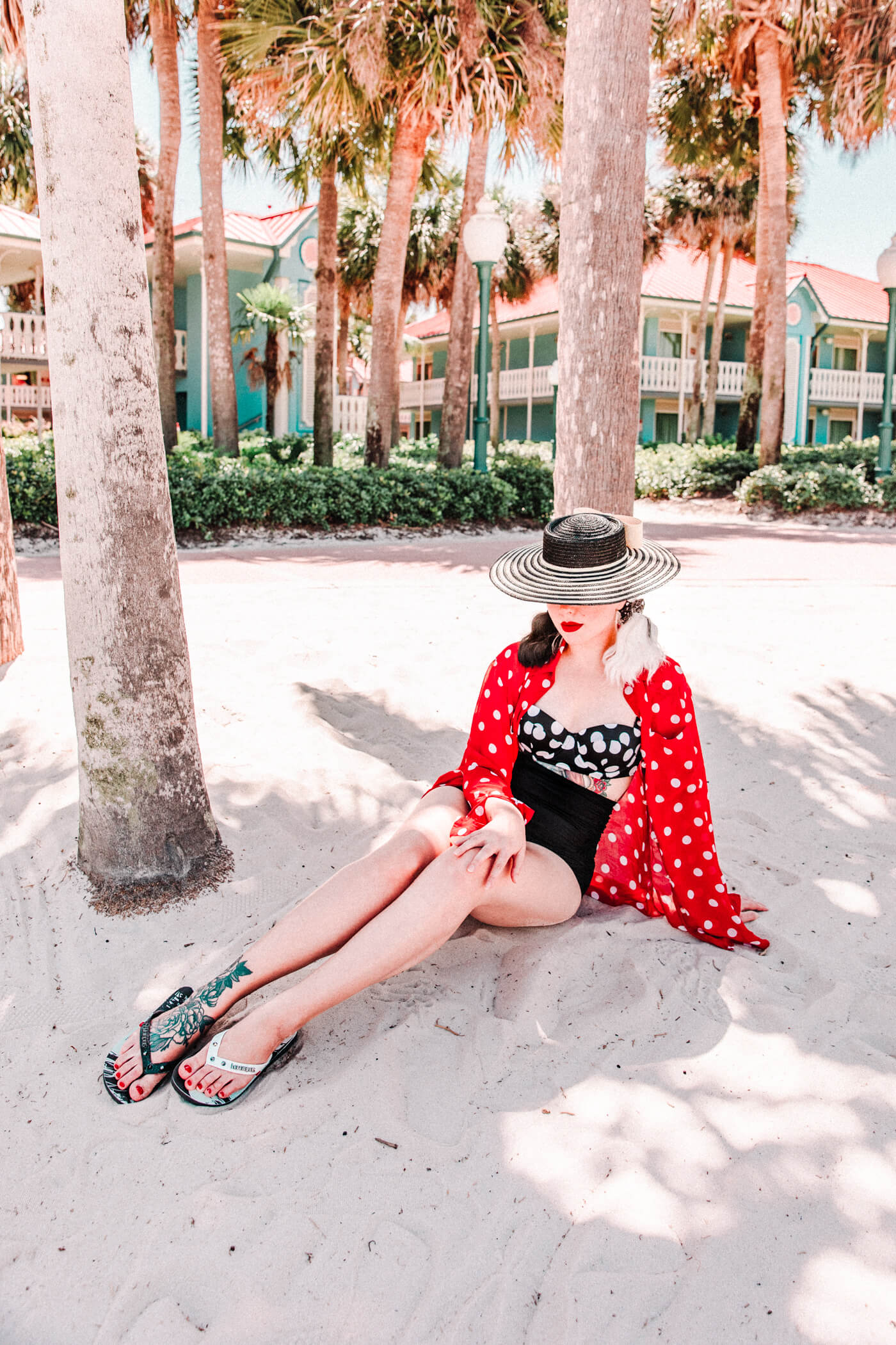 woman at the beach wearing polka dot swimwear