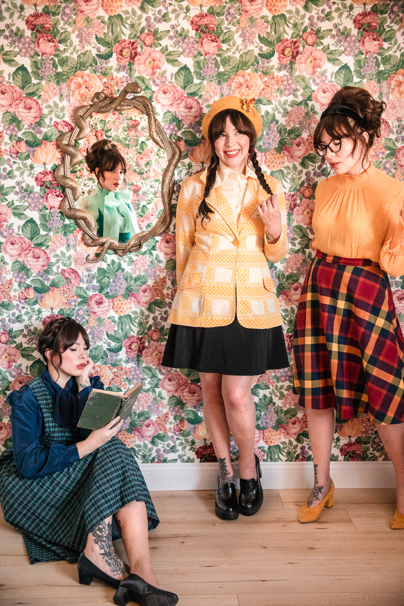 Evelyn Bourdon in outfits inspired by the four Hogwarts Houses of Harry Potter, in front of Pottery Barn Teen Nagini mirror