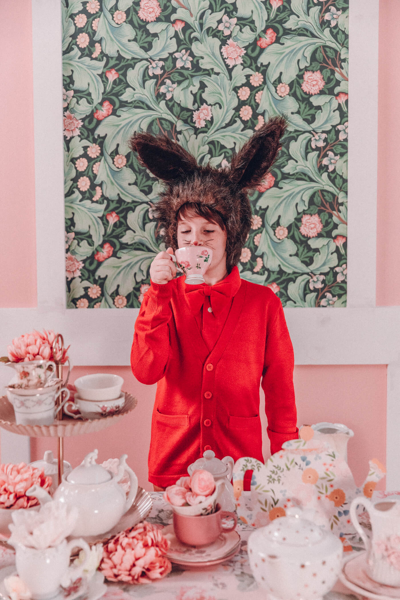 March Hare and Mad Hatter Costumes surrounded by tea cups