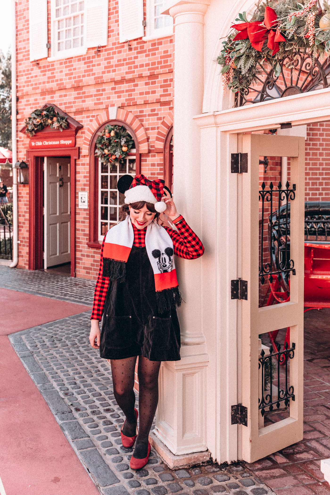 woman in red and black outfit