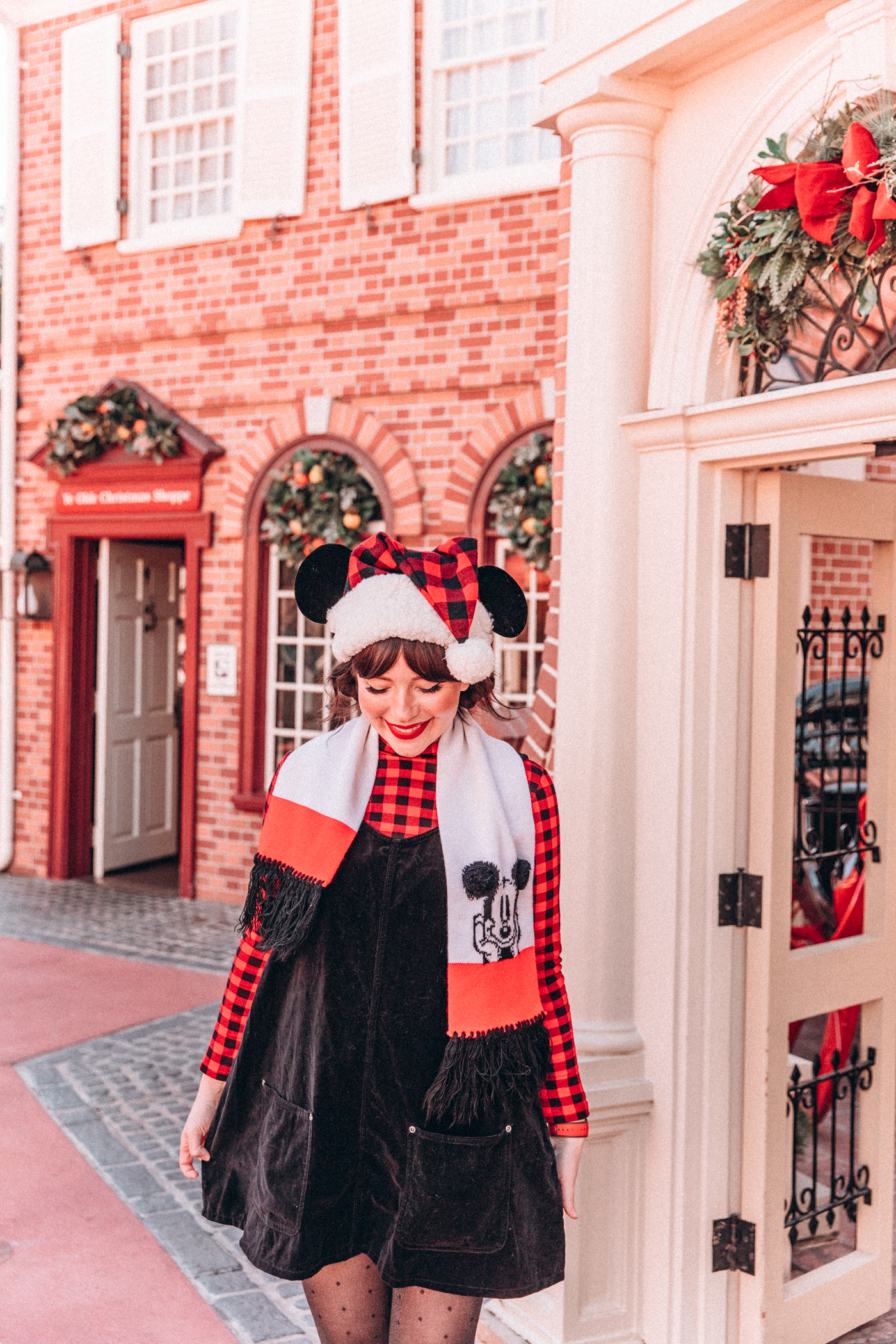 woman in red and black dress and long sleeves