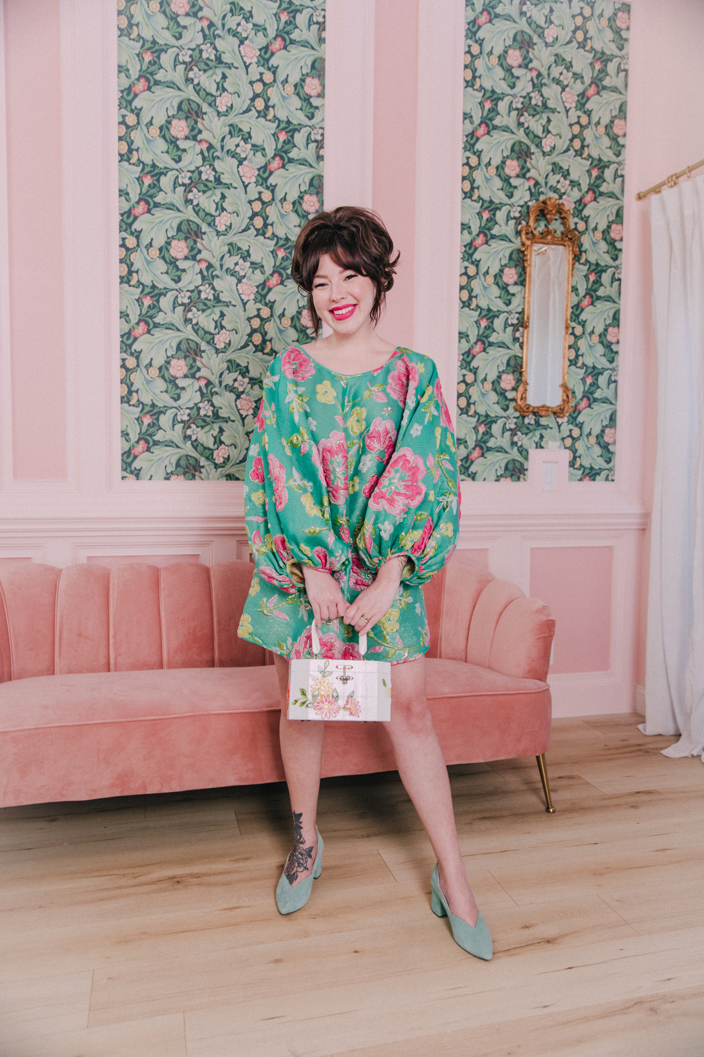 woman wearing green floral Good Luck Dress