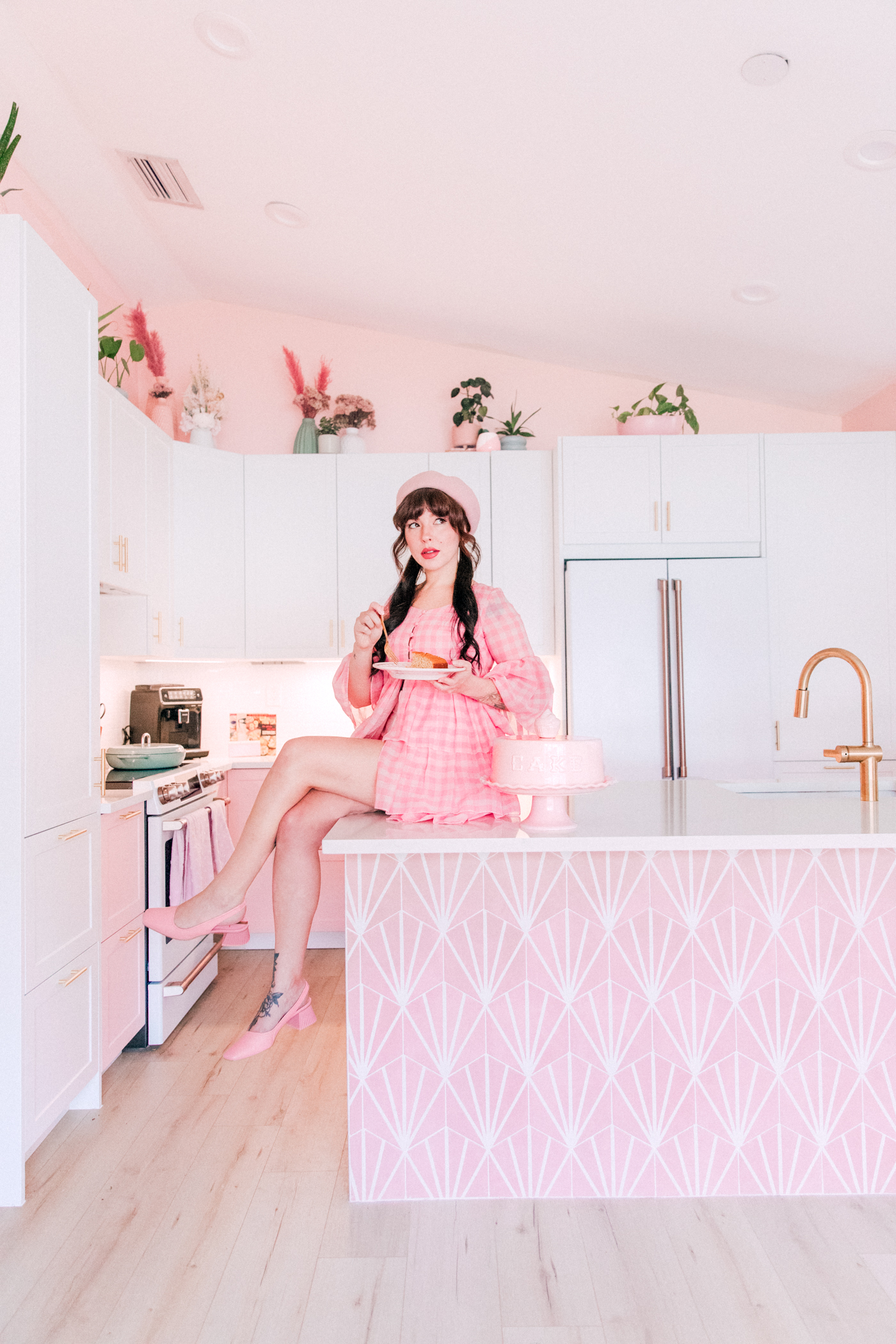 woman sitting on a kitchen island and sharing finding success in failure