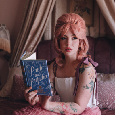 Evelyn Bourdon wearing a Most Ardently corset and reading Pride and Prejudice