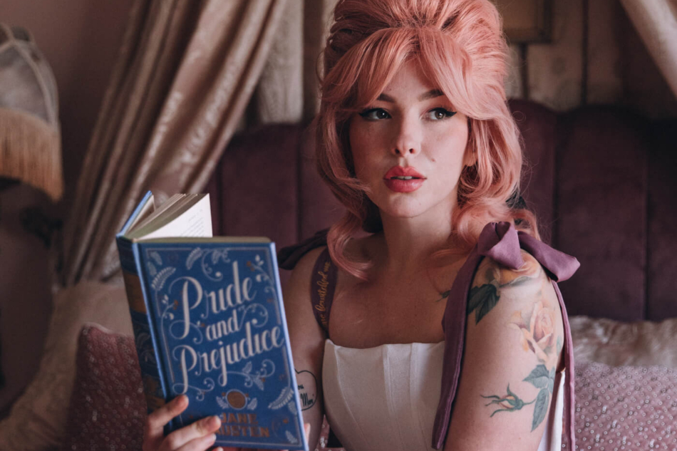 Evelyn Bourdon wearing a Most Ardently corset and reading Pride and Prejudice